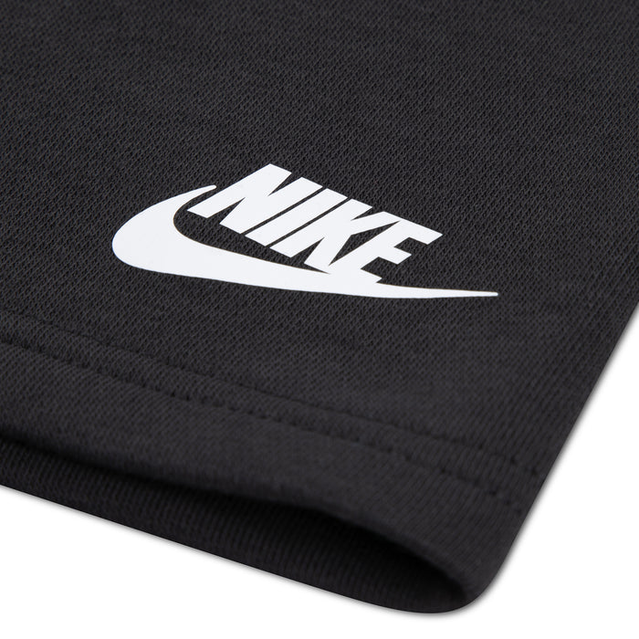 Dark shorts with white Nike logo on the leg