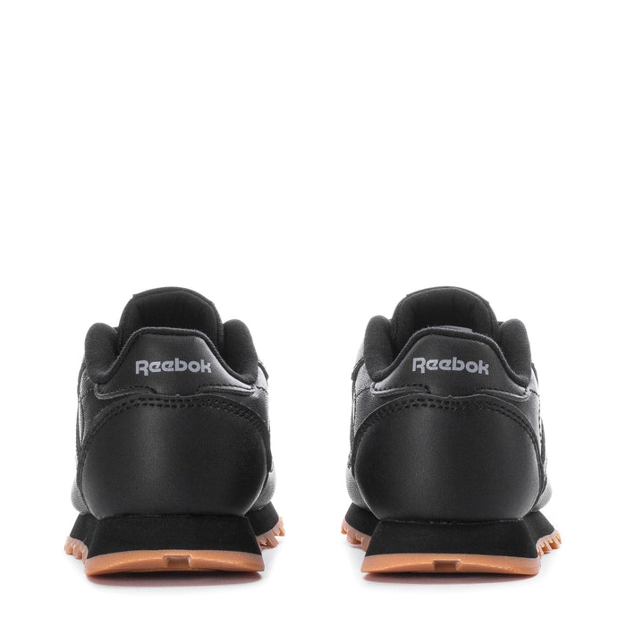 Black toddler leather sneakers with Reebok heel pull tab and gum outsole