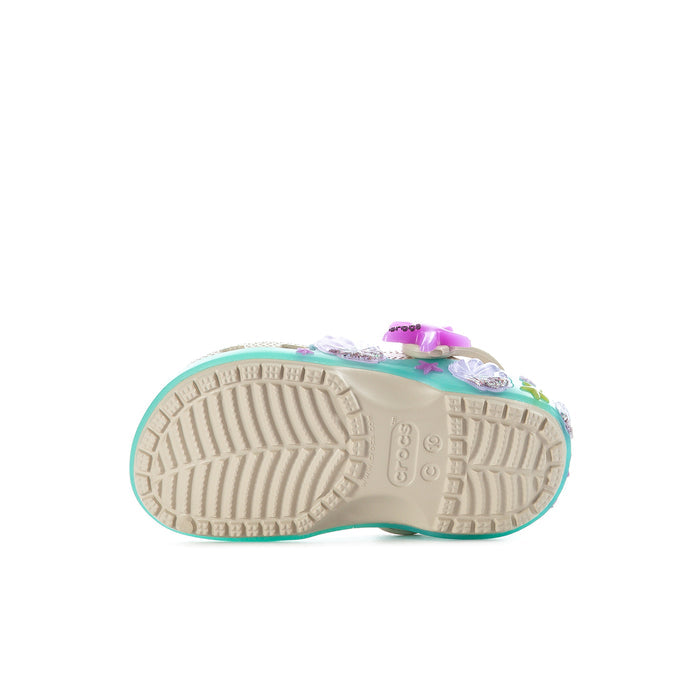Toddler clog outsole with textured tread, teal edge, and visible purple heel accent