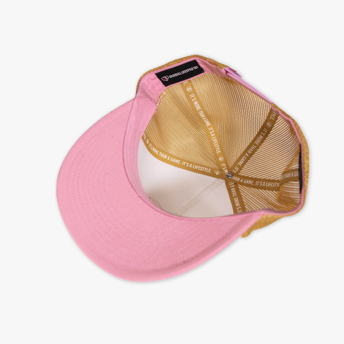 Adult model wearing white and pink Drip Mesh Off Field Snapback snapback