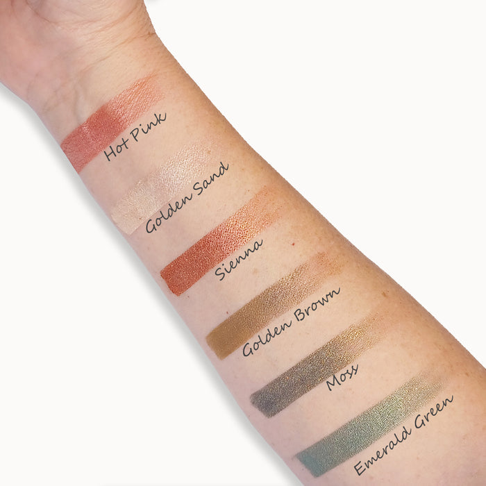 Color swatches on a person's arm with labels for different shades.
