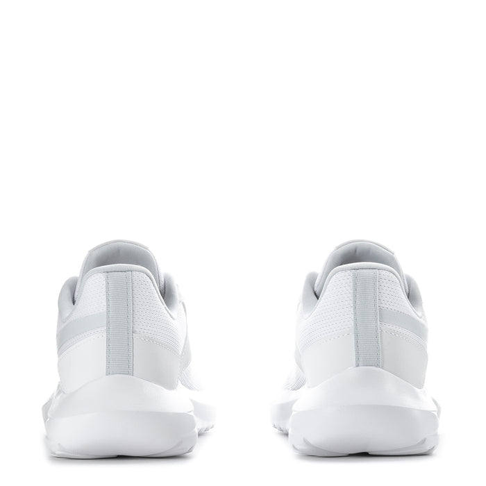 Pair of white women's sneakers heel view with cushioned ankle collar