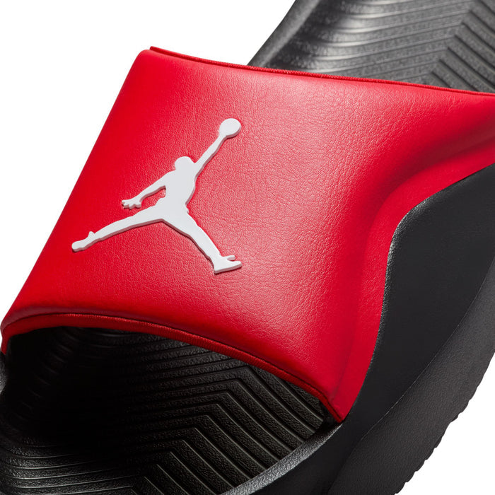 Close-up of men's red slide sandal upper with white Jumpman logo and black side