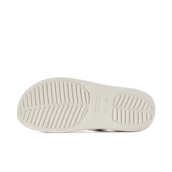 Women’s light beige sandal outsole with textured tread pattern