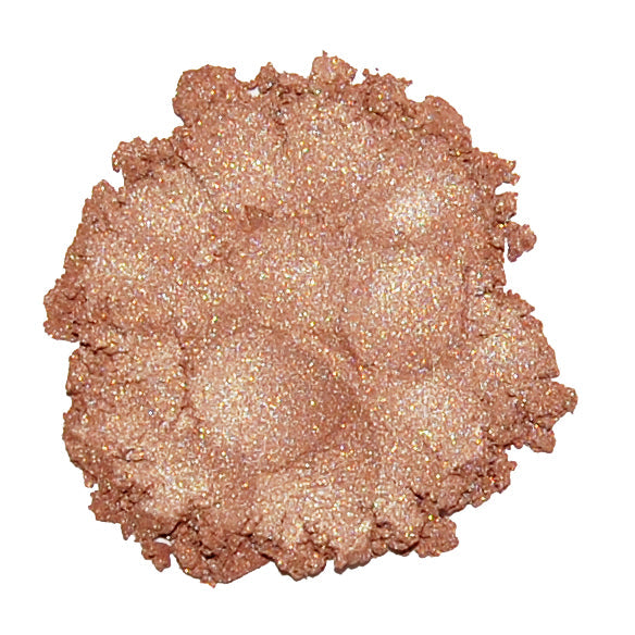 A swatch of Limited Edition #6 Light Copper mineral eye color, showing a shimmery golden copper tone.