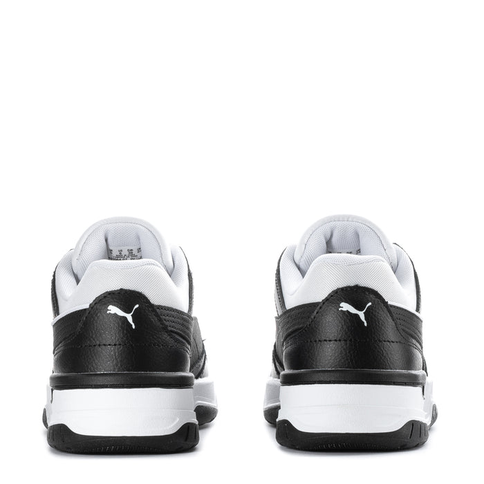 Youth sneakers back view, black uppers with white midsoles and Puma heel