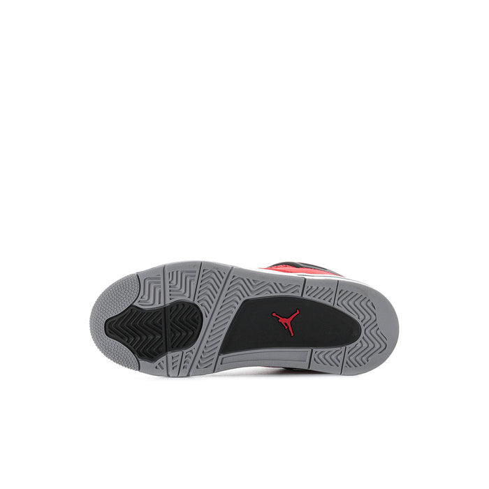 Kids sneaker outsole with dark tread and red Jumpman logo