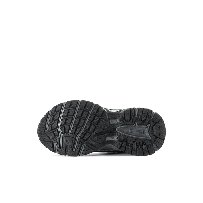 Black toddler sneakers outsole with deep tread and molded traction pattern