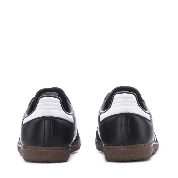 Kids' black Samba OG sneakers with white heel tabs and brown gum heels