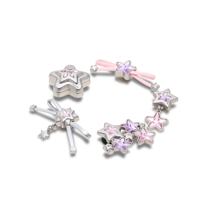 Jibbitz star and bow charms, silver bases with purple and pink glitter accents