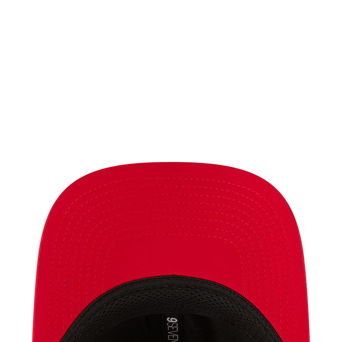 Red cap underside with black brim and 9SEVENTY Stretch band label