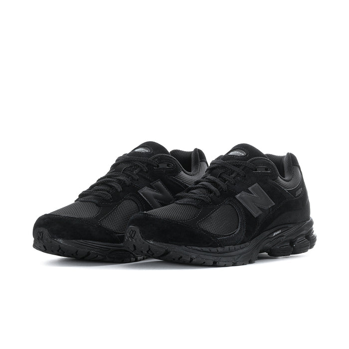 Men's black lace-up sneakers with mesh upper and textured rubber outsole