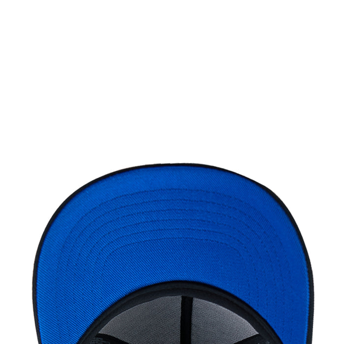 Blue interior of snapback cap with black seam and stitched panel