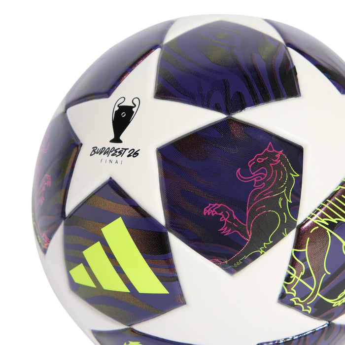 Mini soccer ball close-up with white star panel, dark purple pattern, neon yellow Adidas logo