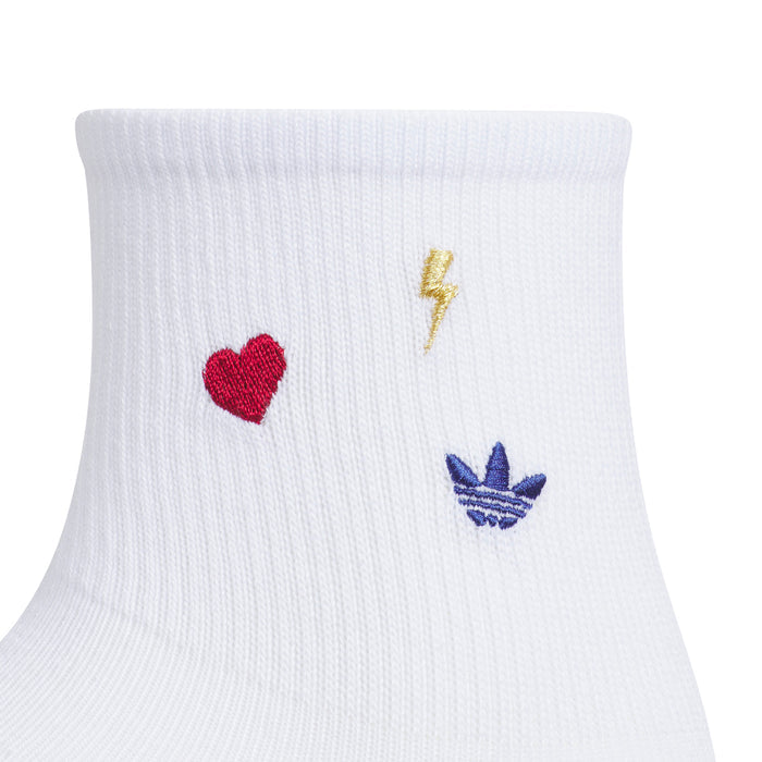 White high-quarter socks with red heart, blue trefoil, and gold lightning patch
