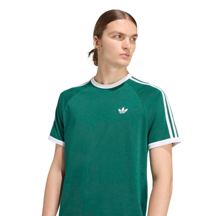 Men's green t-shirt with white crew neck and small chest trefoil logo