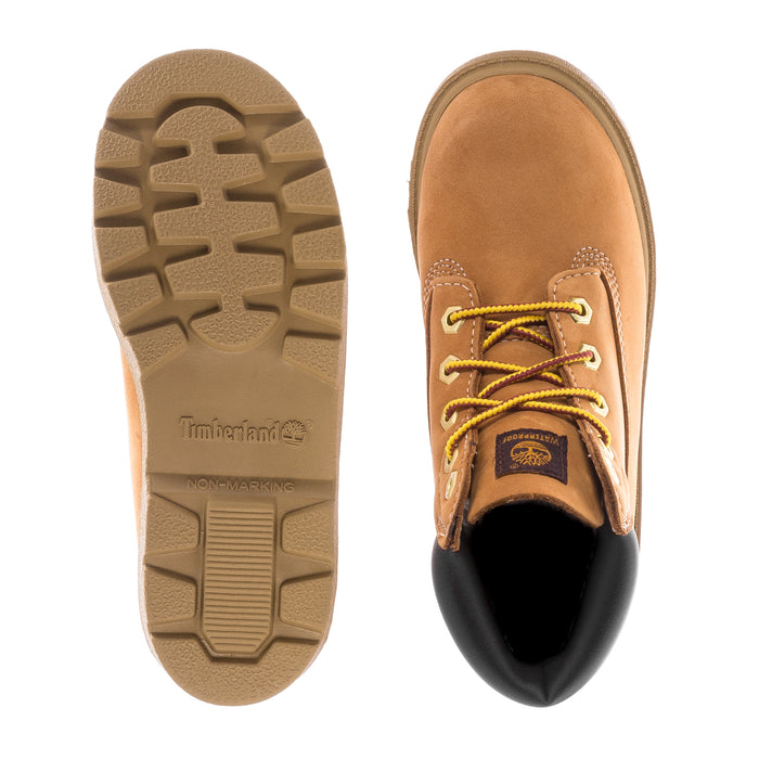 Toddler boot outsole and inside view with yellow laces on tan leather upper