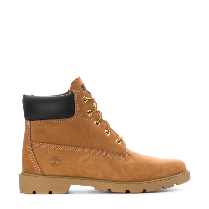 Youth 6-inch wheat nubuck boot with black collar, lace-up, lug sole