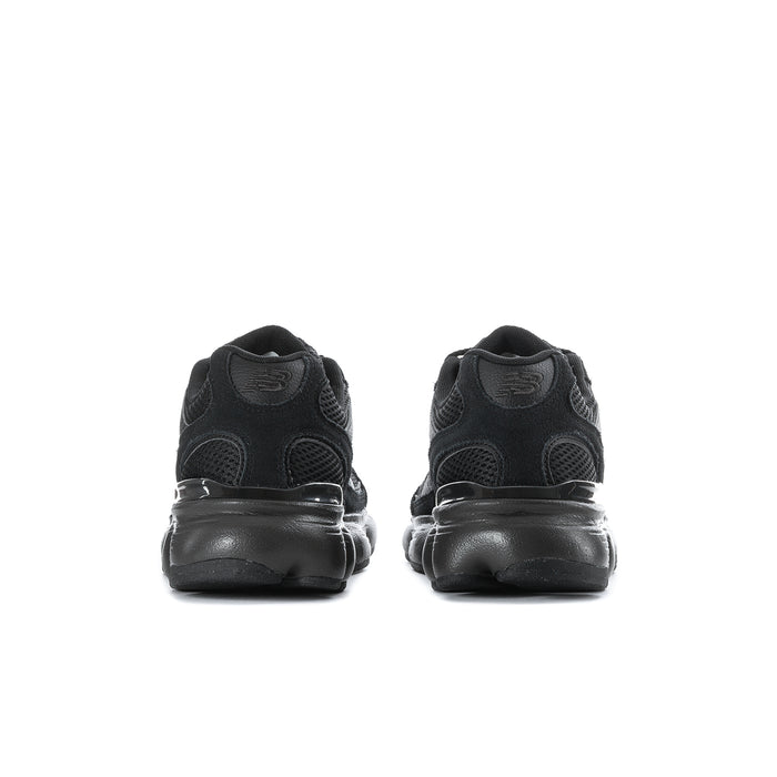 Black athletic sneakers, rear view with cushioned collar and sculpted heel