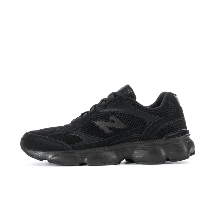 Black lace-up athletic sneaker with N logo and chunky outsole