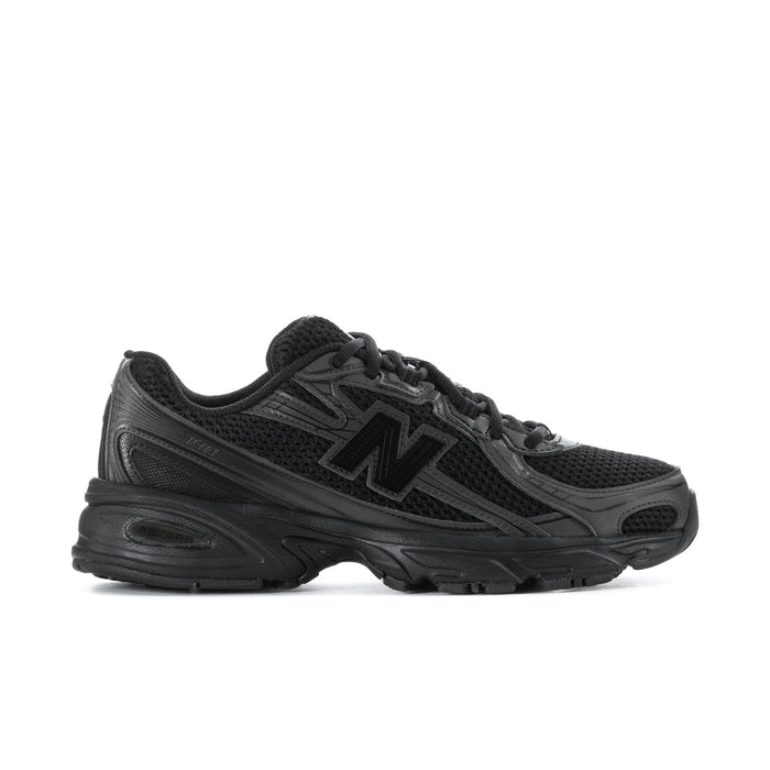 Black and dark gray women's running sneakers, lace-up with cushioned sole