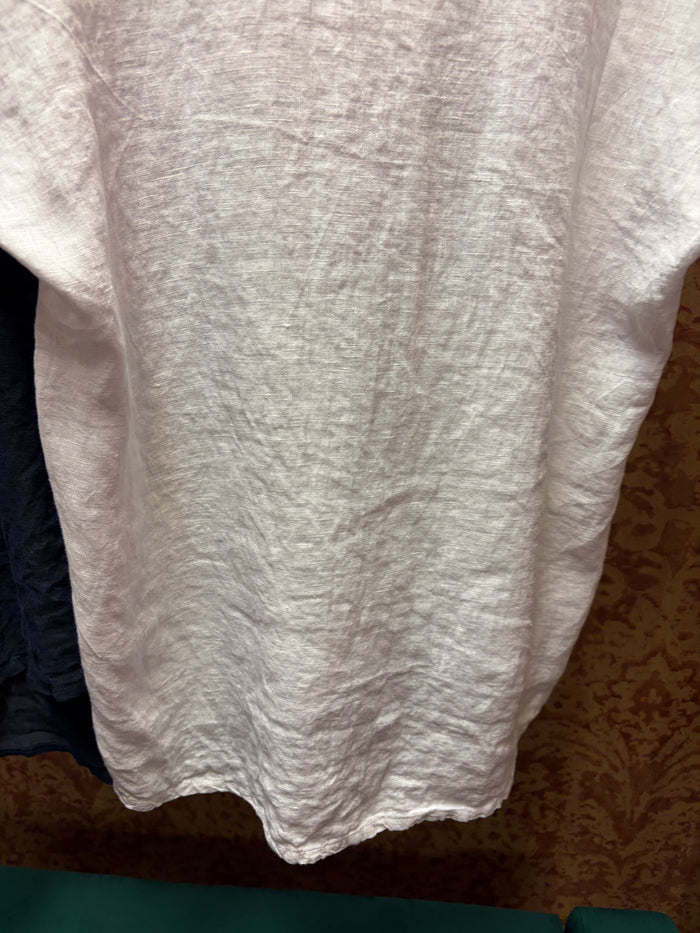 Camille & Co. ruffle linen top with short sleeves and delicate ruffle details, ideal for casual or summer outfits.