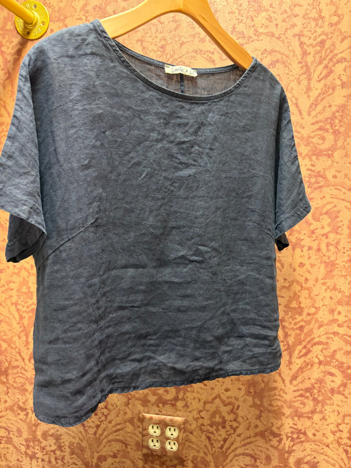Light beige linen tee from Camille & Co., casual tops with a relaxed fit and short sleeves, displayed on a neutral background.