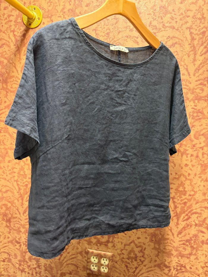 Light beige linen tee from Camille & Co. featuring a relaxed fit, short sleeves, and a casual, breathable design.