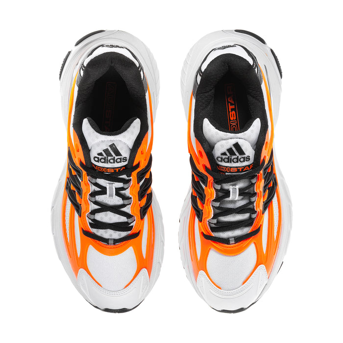 Men's white running shoes with black interior and solar orange side trim, lace-up