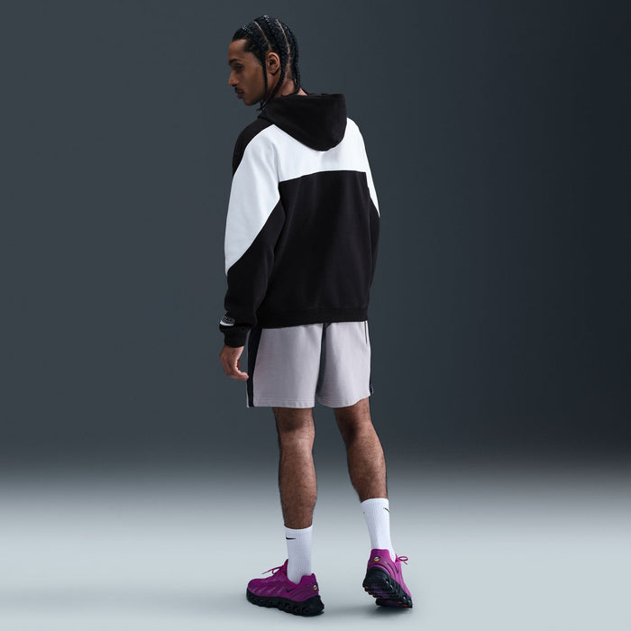 Men's black and white Air fleece pullover hoodie, side view with hood and drawstring