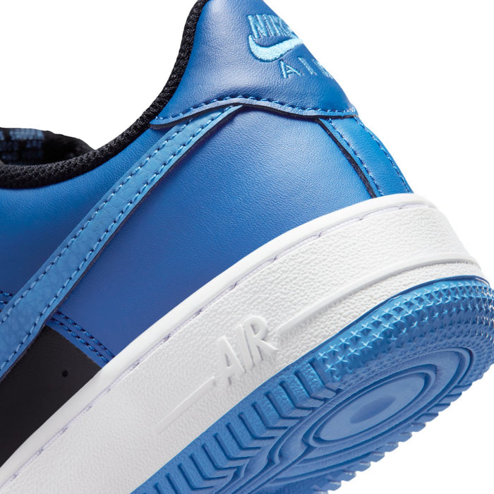 Nike Air Force 1 side close-up: blue collar and white midsole with AIR detail