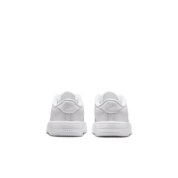 Back view of toddler white low-top sneakers with heel tab and lace-up