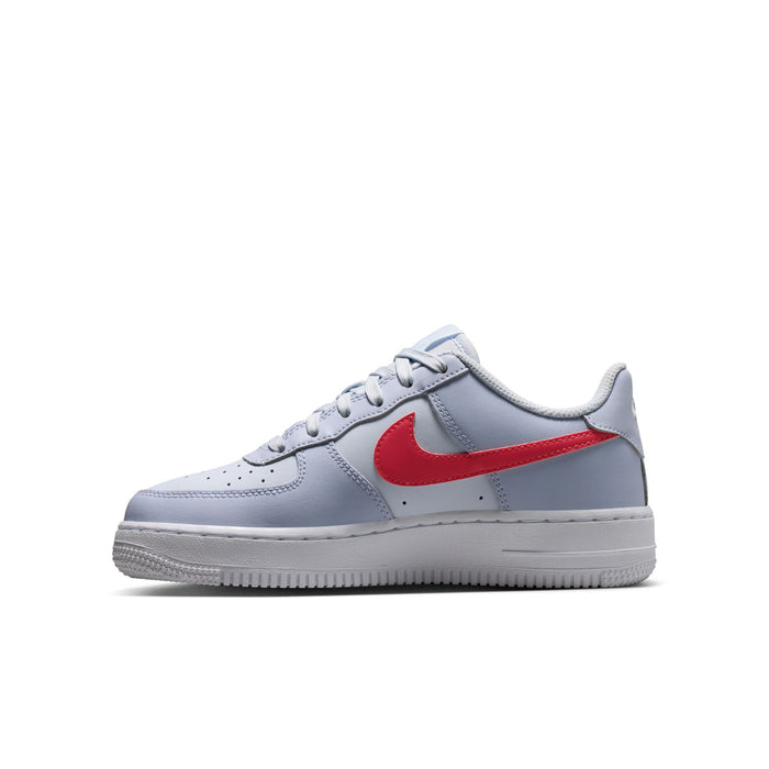 Youth Nike low-top sneakers, light blue-gray uppers with red Swoosh and white sole