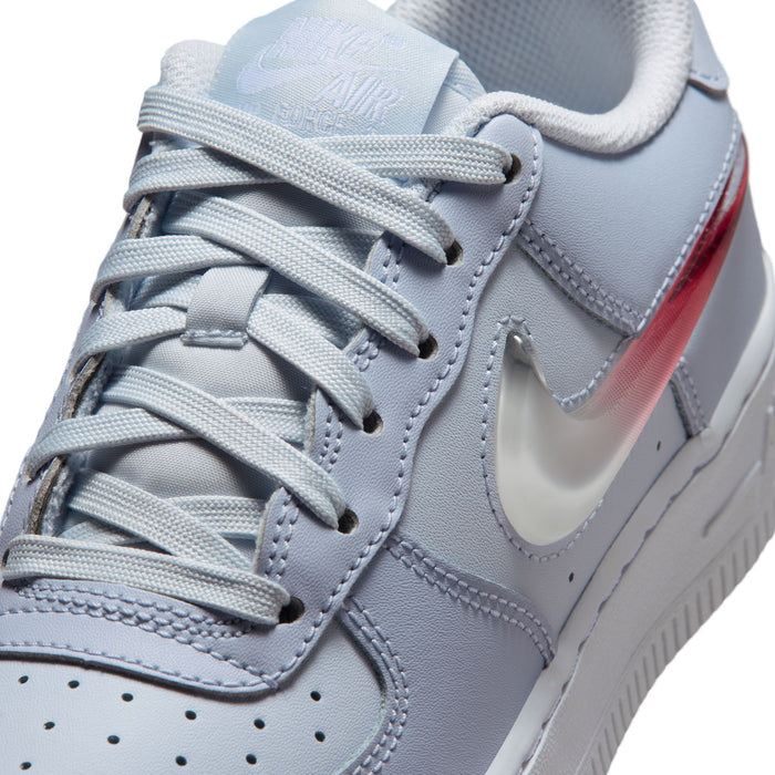 Close-up of youth light blue-gray sneaker laces with red-and-white Swoosh