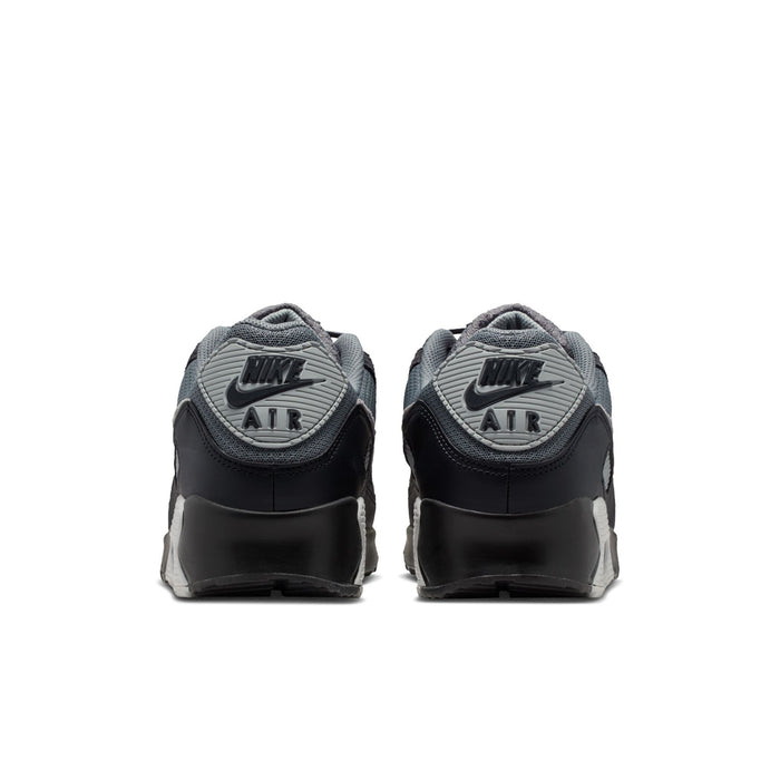 Men's Nike Air Max 90 shoes, heel view showing Nike Air branding and black back panels