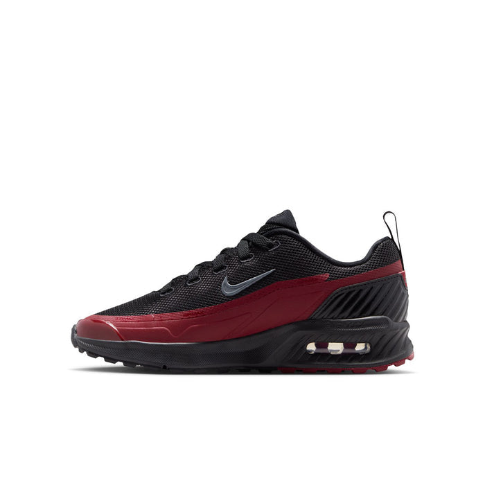 Youth running sneakers, black upper with red side stripe and visible Air heel