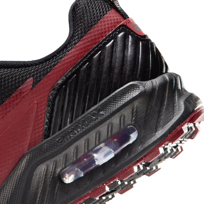 Youth Air unit close-up: clear heel window on black midsole with red edge
