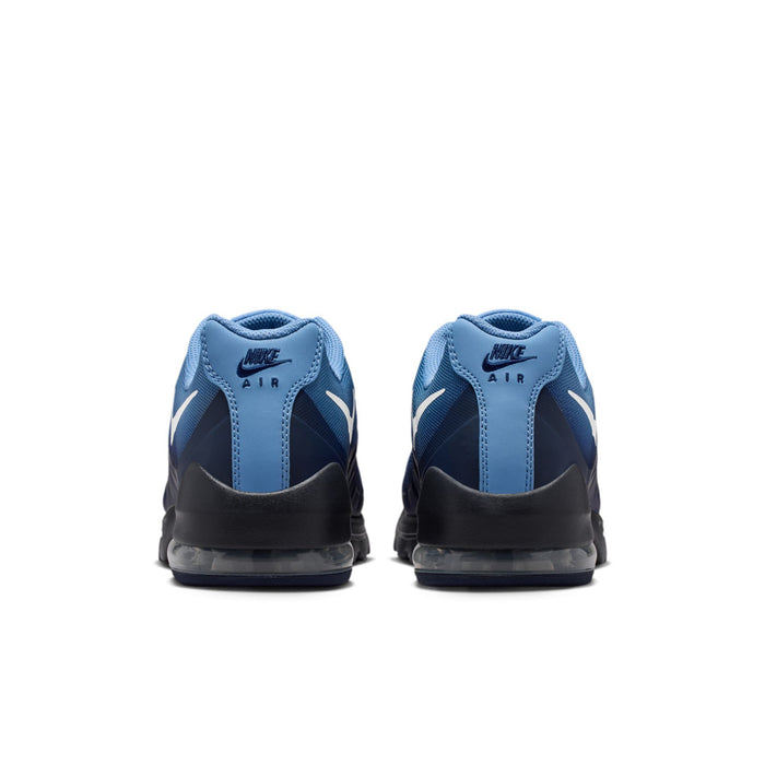 Pair of men's blue running shoes with dark heel panels and lace-up backing