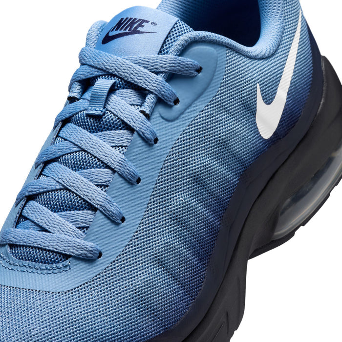 Men's blue mesh running shoe upper with lace eyelets, white swoosh, and dark sidewall
