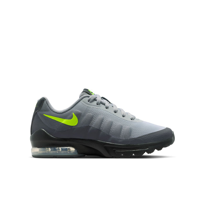 Youth running shoes in dark gray with neon green Nike logo and air-cushioned sole