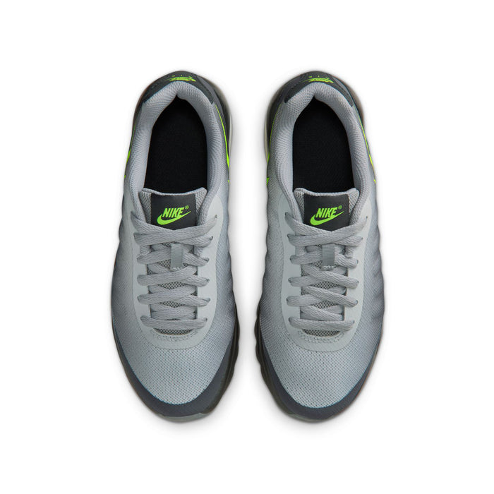 Youth sneakers, gray mesh uppers with neon green Nike label and lace-up closure