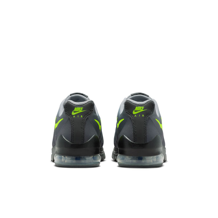 Youth running shoes, dark gray heel with neon green accents and air-cushioned sole