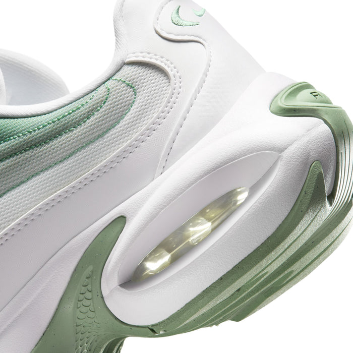 White and mint green women's sneaker close-up, side Swoosh and clear Air window