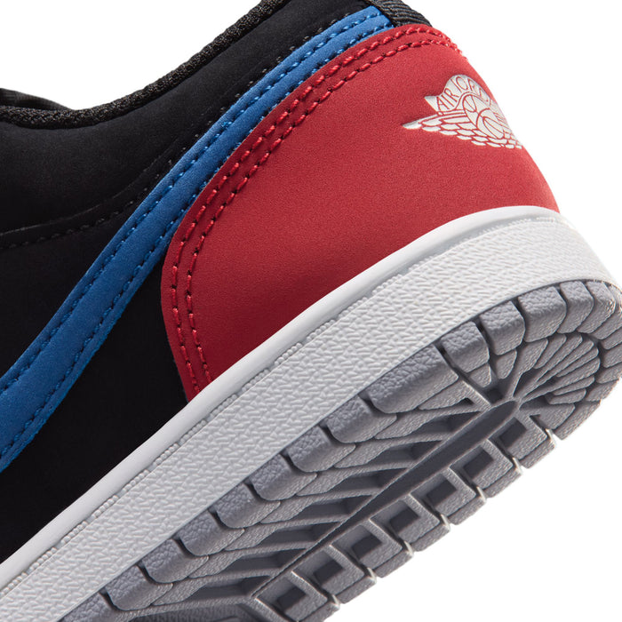 Kids low-top sneaker close-up: red and blue side panel with gray traction outsole