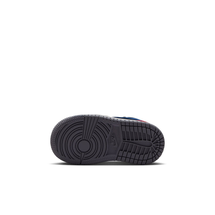 Toddler sneaker outsole in dark gray with circular traction pattern