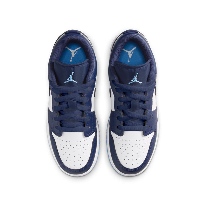Youth low-top sneakers with navy tongues showing Air Jordan logos and white toe perforations