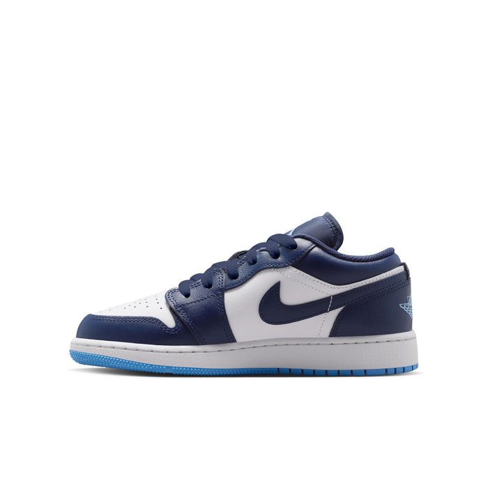 Youth low-top sneakers in navy and white with swoosh and blue outsole