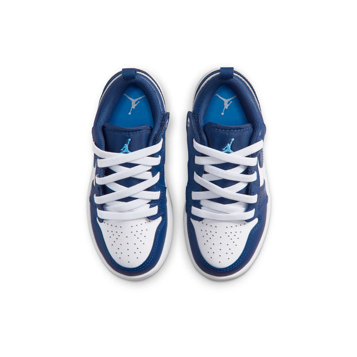 Kids' low-top sneakers, top view of both shoes, navy uppers with white laces