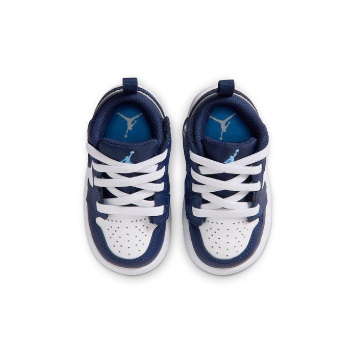Toddler navy and white low-top sneakers with laces and white toe perforations