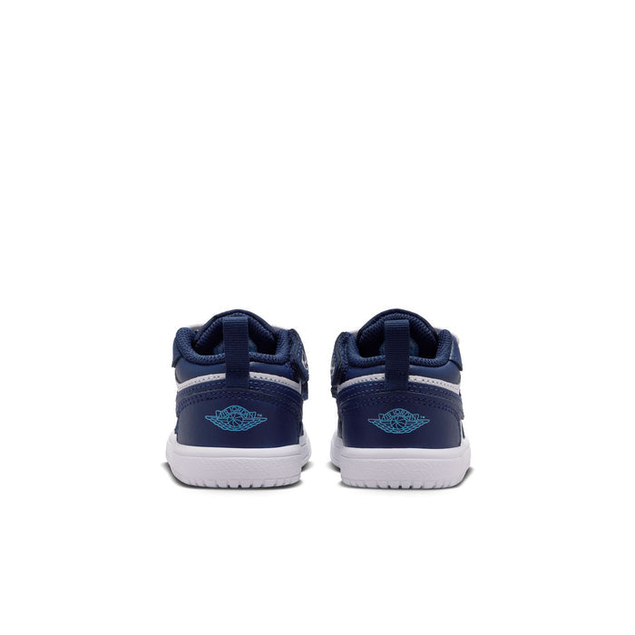 Toddler navy low-top sneakers, rear view pair with heel tab and white midsole